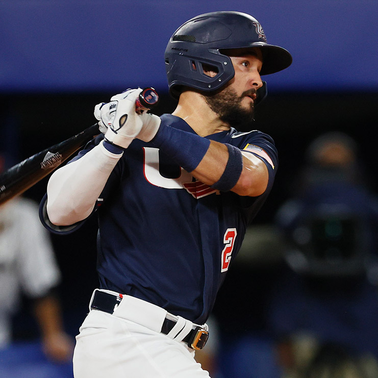 Infielder Eddy Alvarez hits a single in the third inning during the Tokyo 2020 Olympic Games.