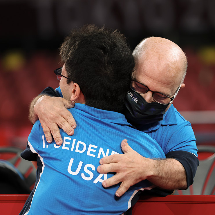 Ian Seidenfeld celebrates his gold medal win in Para Table Tennis Men's Singles with his father, coach and paralympian Mitchell Seidenfeld.