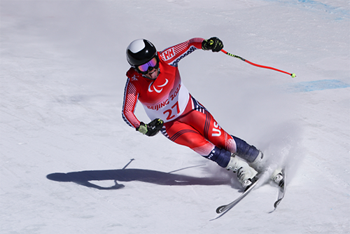 Connor Hogan of Team USA competes in Para Alpine Skiing Men's Downhill Standing.