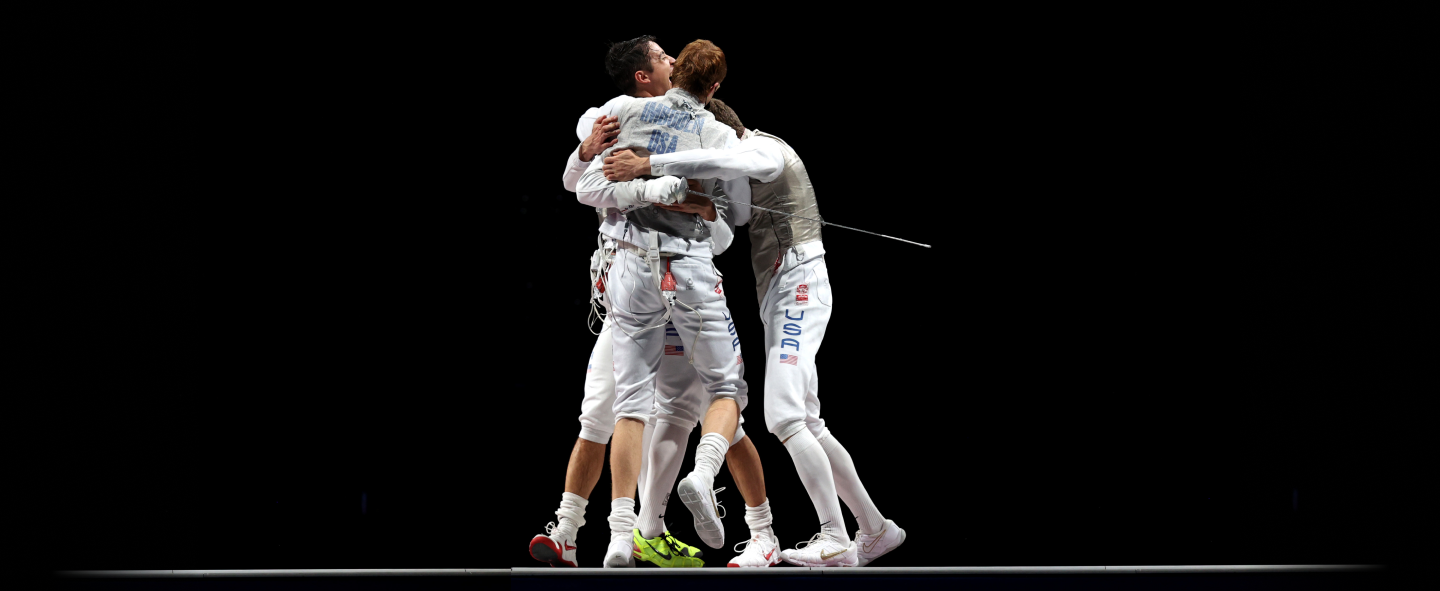 Team USA celebrates after winning the Men's Foil Team Fencing Bronze Medal Match at the Tokyo 2020 Olympic Games.